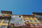 houses in Oporto contrasting with bright blue sky