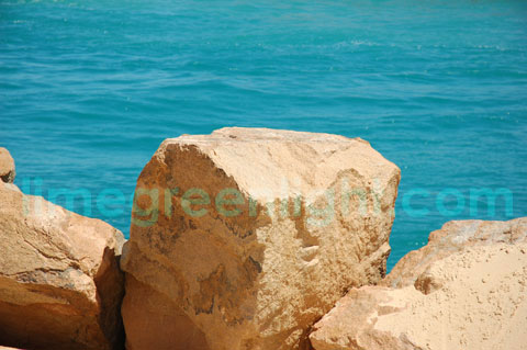 large light coloured rocks by the bright blue sea Victoria Australia